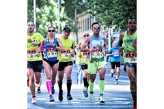 A group of people running a marathon.